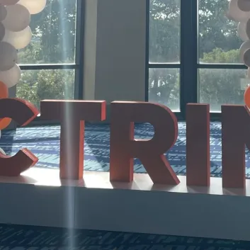 Signage in one of the meeting halls at ACTRIMS